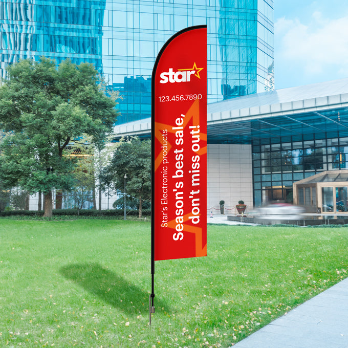 Red feather flag in front of a modern building